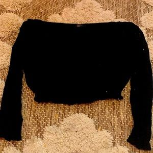 Black off the shoulder crop top.